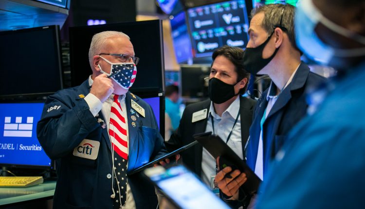 Dow futures fell more than 100 points after Friday's record session

