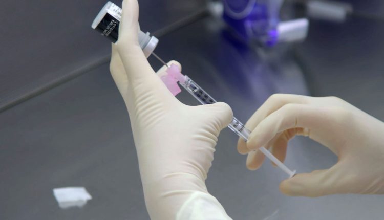 The FDA adviser, who voted against Pfizer's Covid vaccine recommendation, explains why she would be first in line to get it

