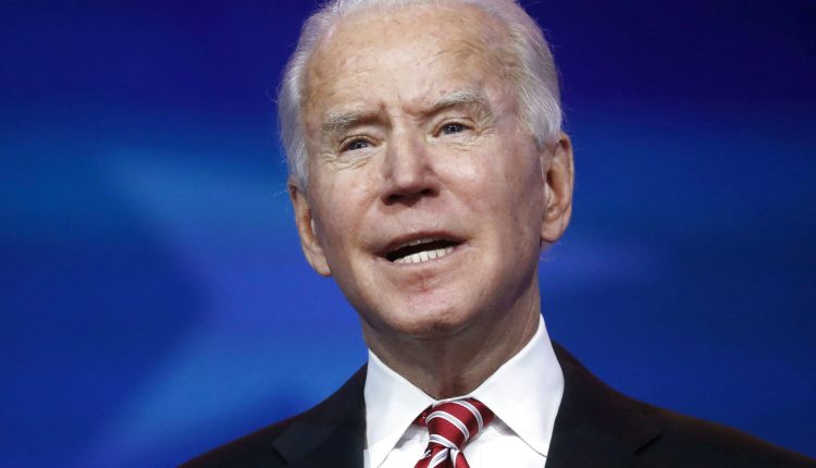 Biden invokes the Defense Production Act to advance Covid vaccine production

