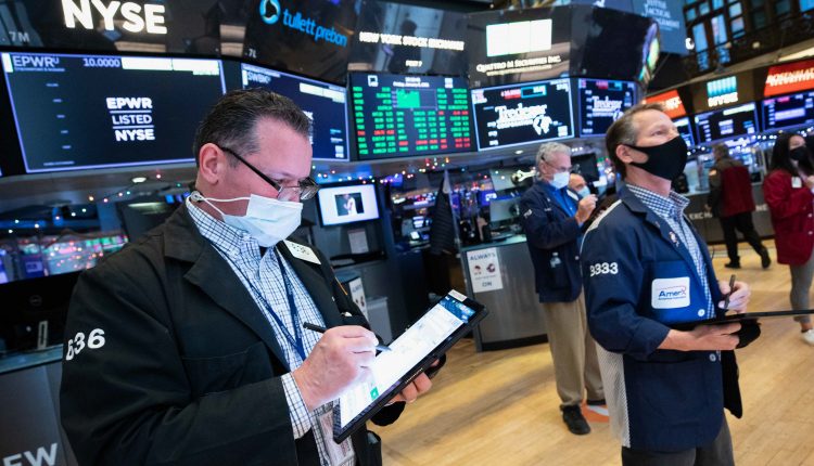 Stocks will retreat from their record levels, with the Dow futures falling 200 points

