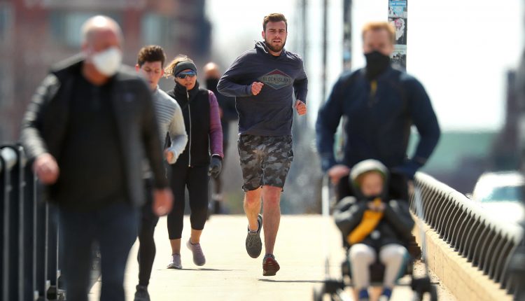 Fully vaccinated people can exercise without masks and hold small outdoor gatherings

