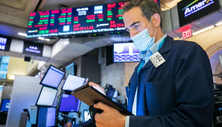 Stock futures are flat after the Dow closed on a record

