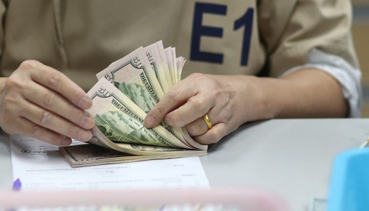 Consumer debt hits a record $16.9 trillion as arrears also mount

