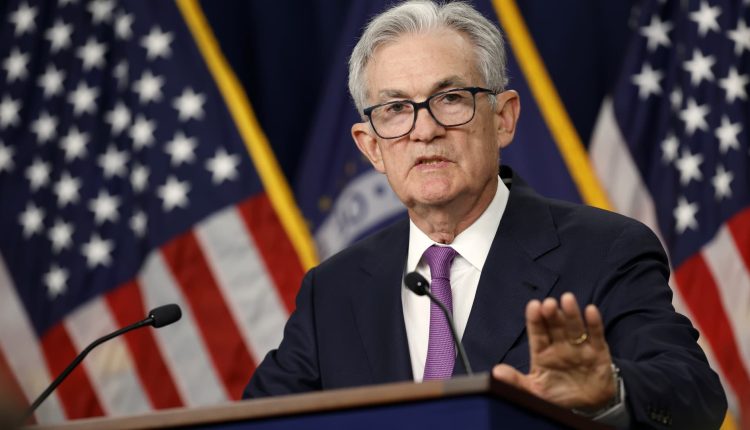 Fed Chair Powell calls talk of cutting rates 'premature' and says more hikes could happen