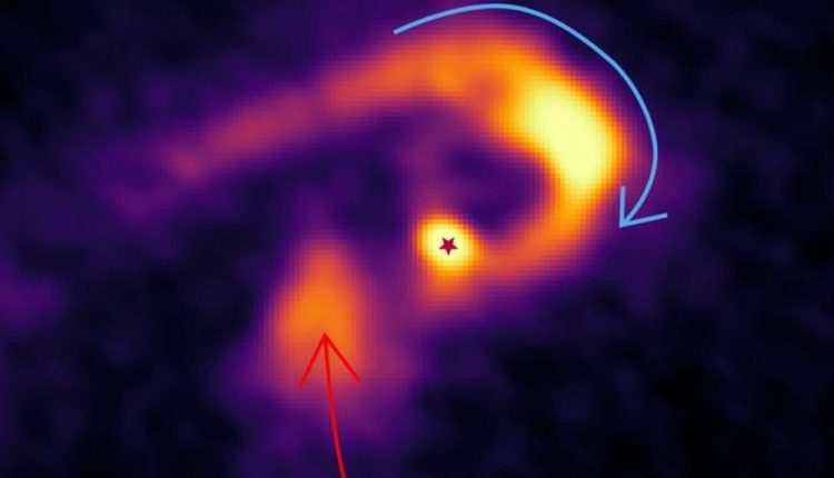 This image shows a high mass proto-star with a red star. The blue and red arrows represent gas rotating and falling into the star. The gas flow (streamer) indicated by the blue arrow transports gas from the molecular cloud core to the high-density region in the vicinity of the protostar. Image Credit: Kyoto University / Fernando Olguin