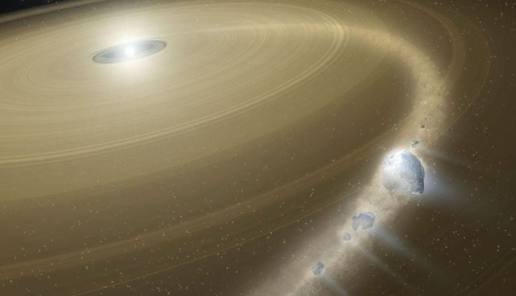 This artist's illustration shows a white dwarf surrounded by a debris disk. Debris from pieces of a captured, Pluto-like object is falling onto the white dwarf. Hubble observations found a strong signal of oxygen which is evidence of ample water content in the object. Image Credit: NASA, Tim Pyle (NASA/JPL-Caltech)