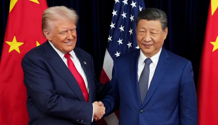 Xi strikes a conciliatory tone at his meeting with Trump in South Korea

