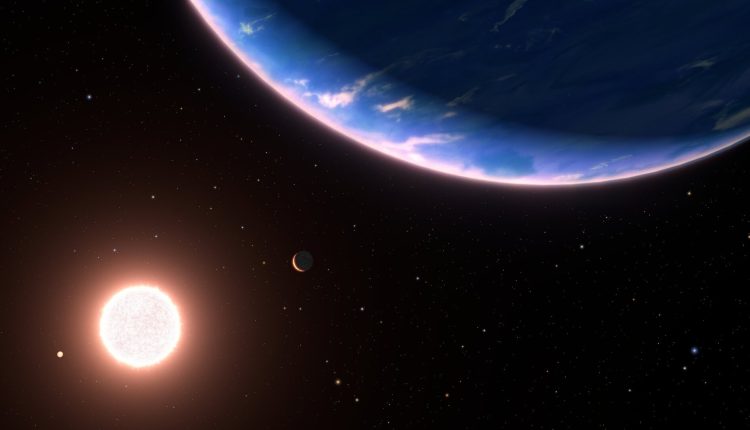 Artist's concept of exoplanet GJ 9237d, with a noticeable pink haze to it. Credit - NASA, ESA, Leah Hustak and Ralf Crawford (STScI)