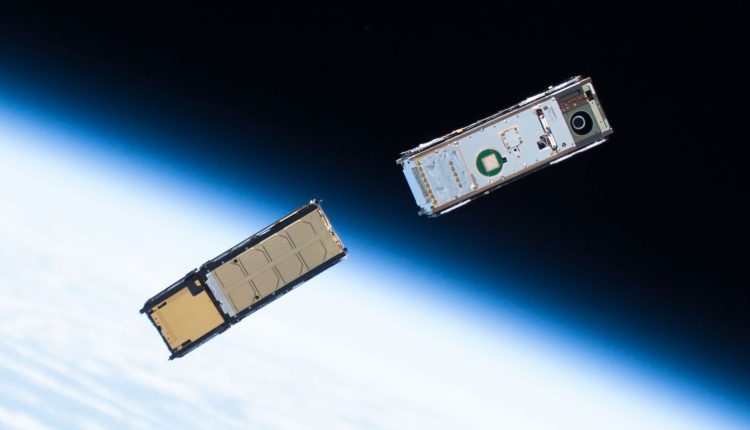Two CubeSats orbiting around Earth after being deployed from the ISS. Google is looking at ways satellites can be used for data centres of the future (Credit : NASA)
